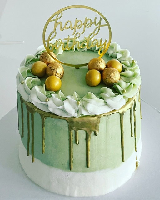 Elegant birthday cake with decorative details