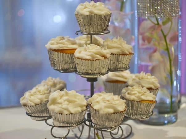Assorted decorated cupcakes in a cupcake stand