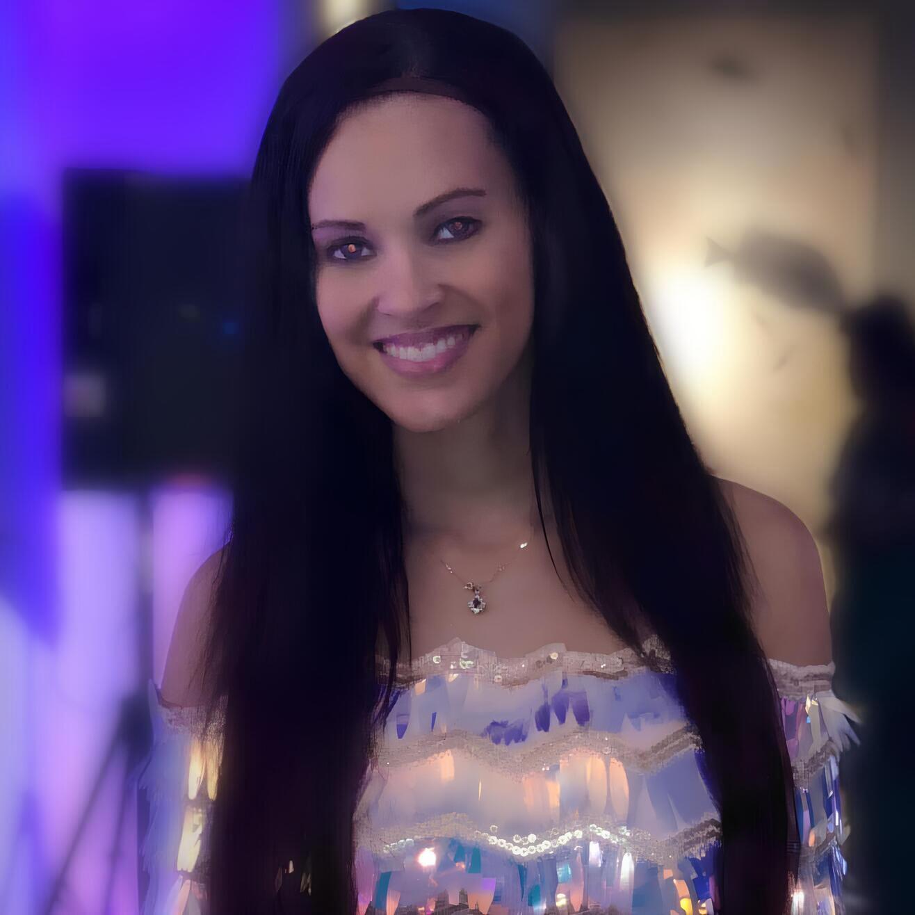 Shanna, founder and owner of Sugar and Spice Treat Boutique, smiling warmly